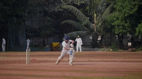 Young professional Indian cricket player playing an impressive cover drive Vídeo Stock 331459645