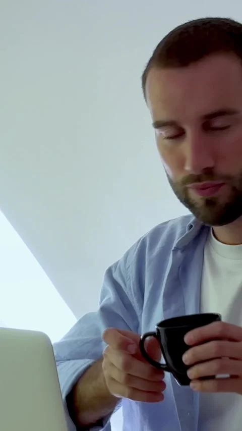 Young professional man with a beard concentrating on his work, typing Stock Footage 345077851