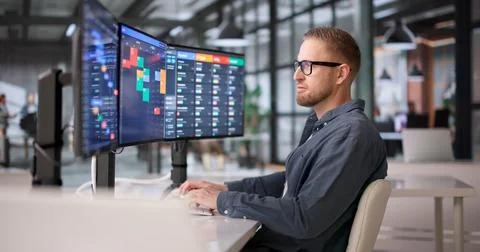 Young Professional Managing Project Timeline On Office Computer With Gantt So Stock Photos