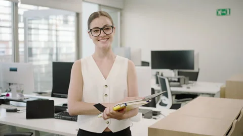 Young Professional in Modern Office values career, commitment, success, teamwork Stock Footage 278849280