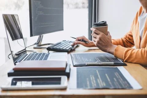 Young Professional programmer working at developing programming and website w Stockfoto's