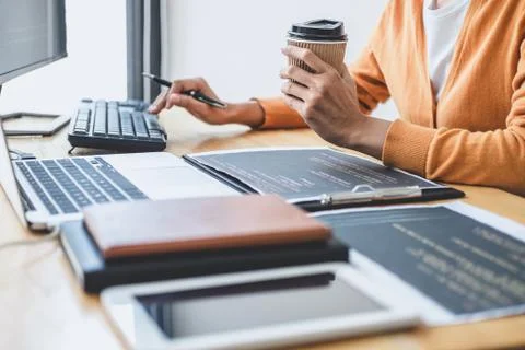 Young Professional programmer working at developing programming and website w Stock-Fotos