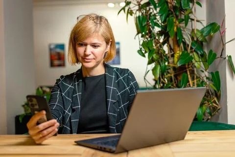 Young Professional Texting During Remote Work Stock Photos