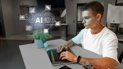 Young professional working with artificial intelligence concepts on a laptop in 스톡 사진