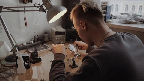 Young professional is working on a microscheme Stock Footage 86568085