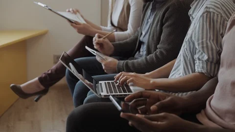 Young professionals are working hard on a project. Gadgets closeup. Stock Footage 86531245
