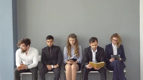 Young professionals on job interview. University graduates trying to find work Stock Footage 76203207