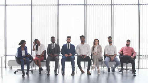 Young professionals on job interview. University graduates trying to find work. Stock Footage 103036341