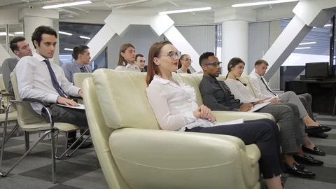 Young professionals at weekly meeting in large company indoors. Stock Footage 85374337