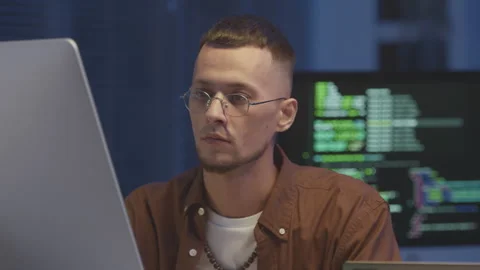 Young Programmer Coding at Night Stock Footage 259167772
