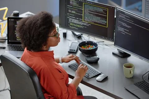 Young Programmer in Glasses Typing Fixing Errors Stock-Fotos
