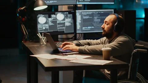 Young programmer typing source code in office 스톡 사진