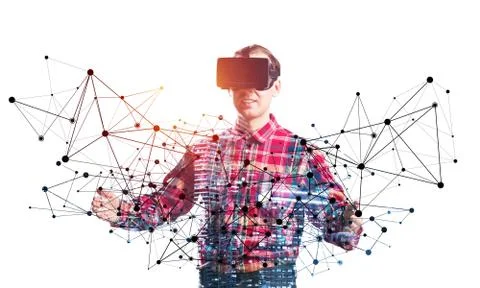 Young programmer wearing VR headset working Stock-Fotos