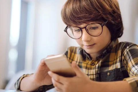 Young programmer working on phone 写真素材