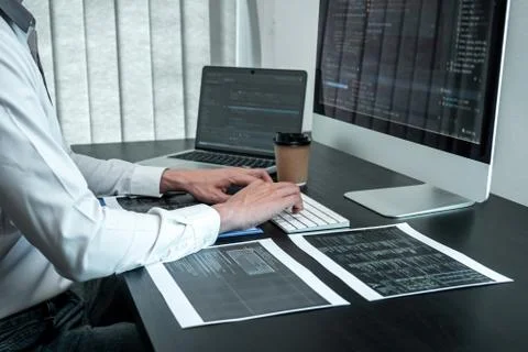Young Programmer working in software javascript computer in IT office, Writin Stock Photos