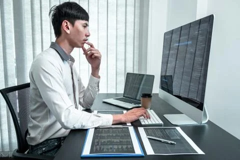 Young Programmer working in software javascript computer in IT office, Writin Stock Photos