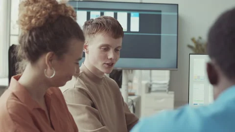 Young Programmers Coworking on Project in Office Stock Footage 219313668