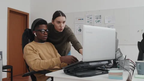 Young Programmers Discussing How To Solve Problem Stock Footage 232665021