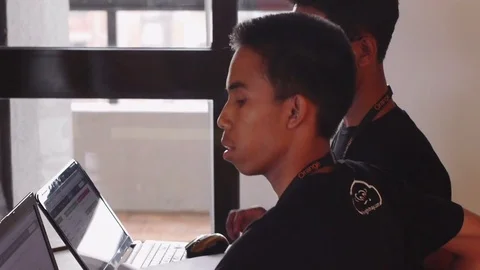 Young programmers at kLab, an Open Space for IT Entrepreneurs in Kigali, Rwanda Stock Footage 82350618