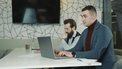 Young programmers who are engaged in web programming and work remotely. Stock Footage 149514399