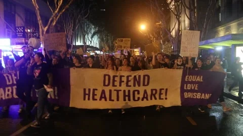 Young protesters marching chanting "F-ck the Supreme Court" Stock Footage 199921213