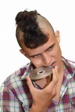 Young punk and CD. Stock Photos