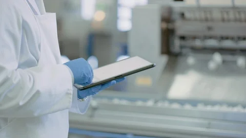 Young Quality Supervisor or Food Technician is Inspecting Automated Production Stock Footage 113036268