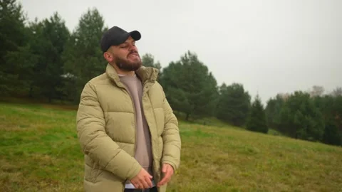 Young rap guy singers singing performing hip hop music outdoors on park Stock-Footage 253832793