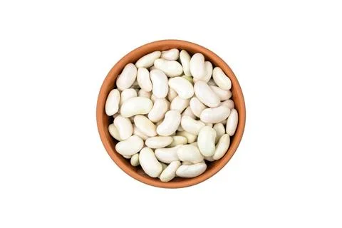 Young, raw white beans in a ceramic bowl. isolated on white background Stock Photos