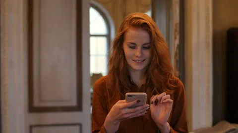 Young Red Hair Caucasian Woman Walking Texting Cellphone Smart Phone In Cafe Stock Footage 98571334