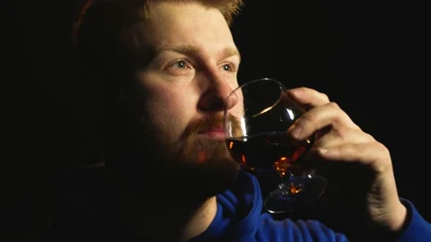 Young red-haired man with a beard drinks konchak Video stock 169012053