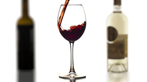 Young red or rose wine pouring into glass bottles background Stock Footage 144568264
