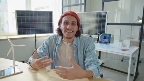 Young Renewable Energy Developer Talking on Camera in Office Stock Footage 230102369