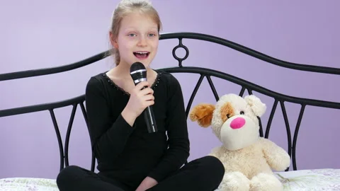 The Young Reporter Interviews With Her Plush Dog 02 Stock Footage 90802913