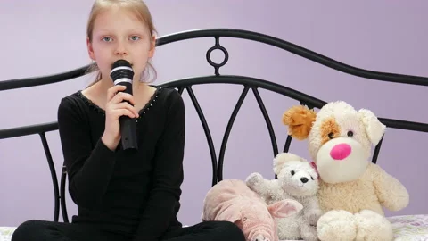 The Young Reporter Interviews With Her Plush Dog 04 Video stock 91048028