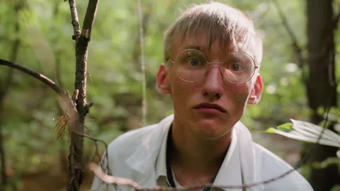 Young Researcher in White Coat Observing Forest Environment Stock Footage 321110543