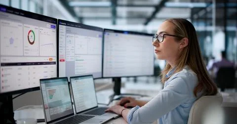 Young Risk Manager Using Laptop To Evaluate Third-party Supplier Compliance D Stock Photos