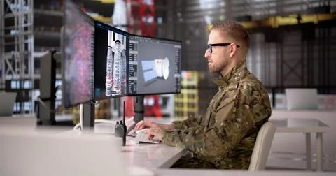Young Rocket Engineer Analyzes Industrial Computer Systems At A Modern Workst Stock-Fotos