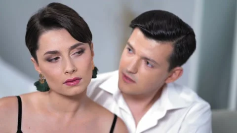 Young Romantic Couple Is Looking At Each Other's Eyes. Video stock 131813932