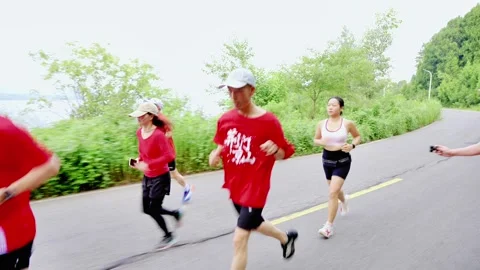 Young runner leading group Stock Footage 341739143