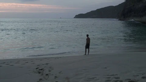 Young runner running in morning along the beach Stock Footage 126004341