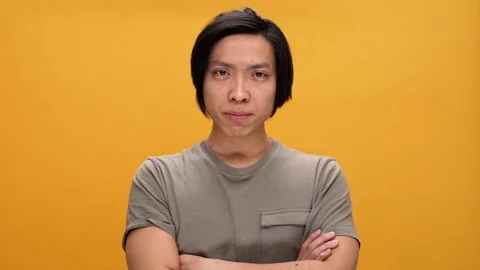 Young sad asian man says no Stock Footage