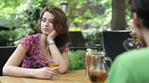 Young sad bored woman on date in cafe, steadicam shot HD Stock Footage