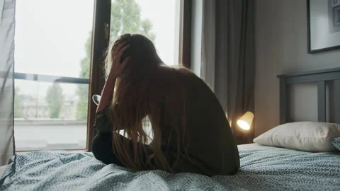 Young Sad Drunk Lonely Woman Drinking Wine in Bed, Emotional Problems and Stock Footage 167271663