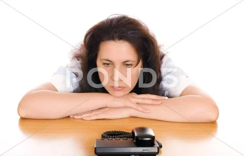 Young sad woman with phone Stock Photos