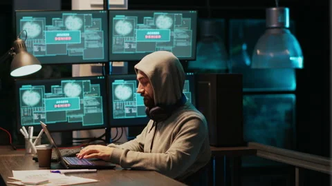 Young scammer trying to break database network Stock-Footage 229332247