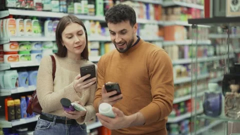 Young scanning QR code on care products Stock-Footage 342126522