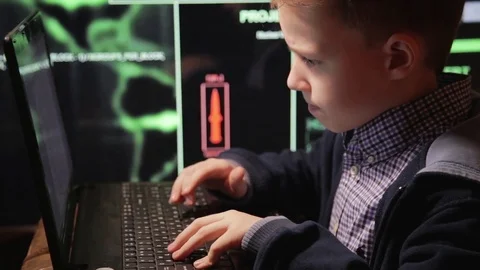 Young schoolboy prodigy - a hacker. Hacker at work. Stock Footage 74455206