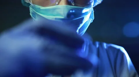 Young scientist conducting an experiment close up Video stock 67399658