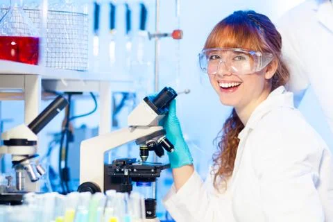 Young scientist having fun in lab. Stock Photos